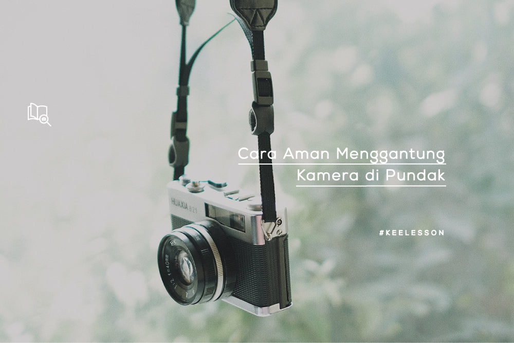 Cara Aman Menggantung Kamera di Pundak